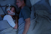 Person sleeping with the ResMed AirFit X30i CPAP mask