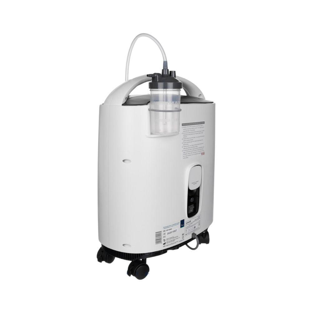 Yuwell 8F-5A oxygen concentrator, rear view with humidifier bottle and filter cover