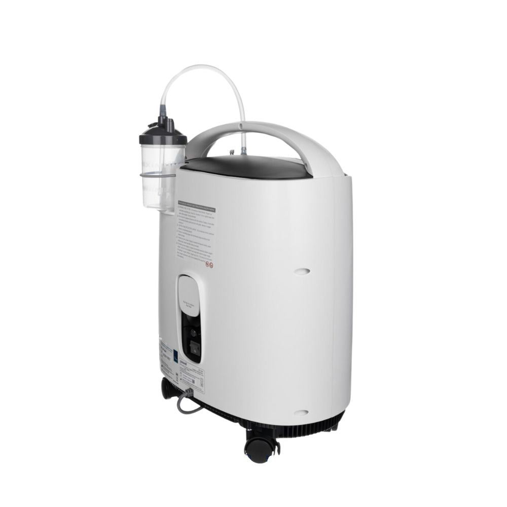 Yuwell 8F-5A oxygen concentrator, rear-side view showing cabinet and caster wheels
